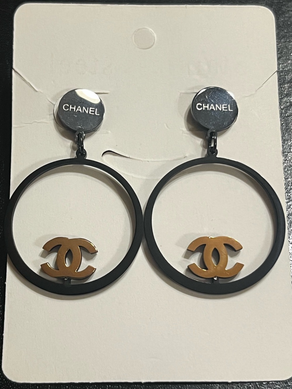 ChaneI Black and Gold Tone Dangle Letter Logo Earrings